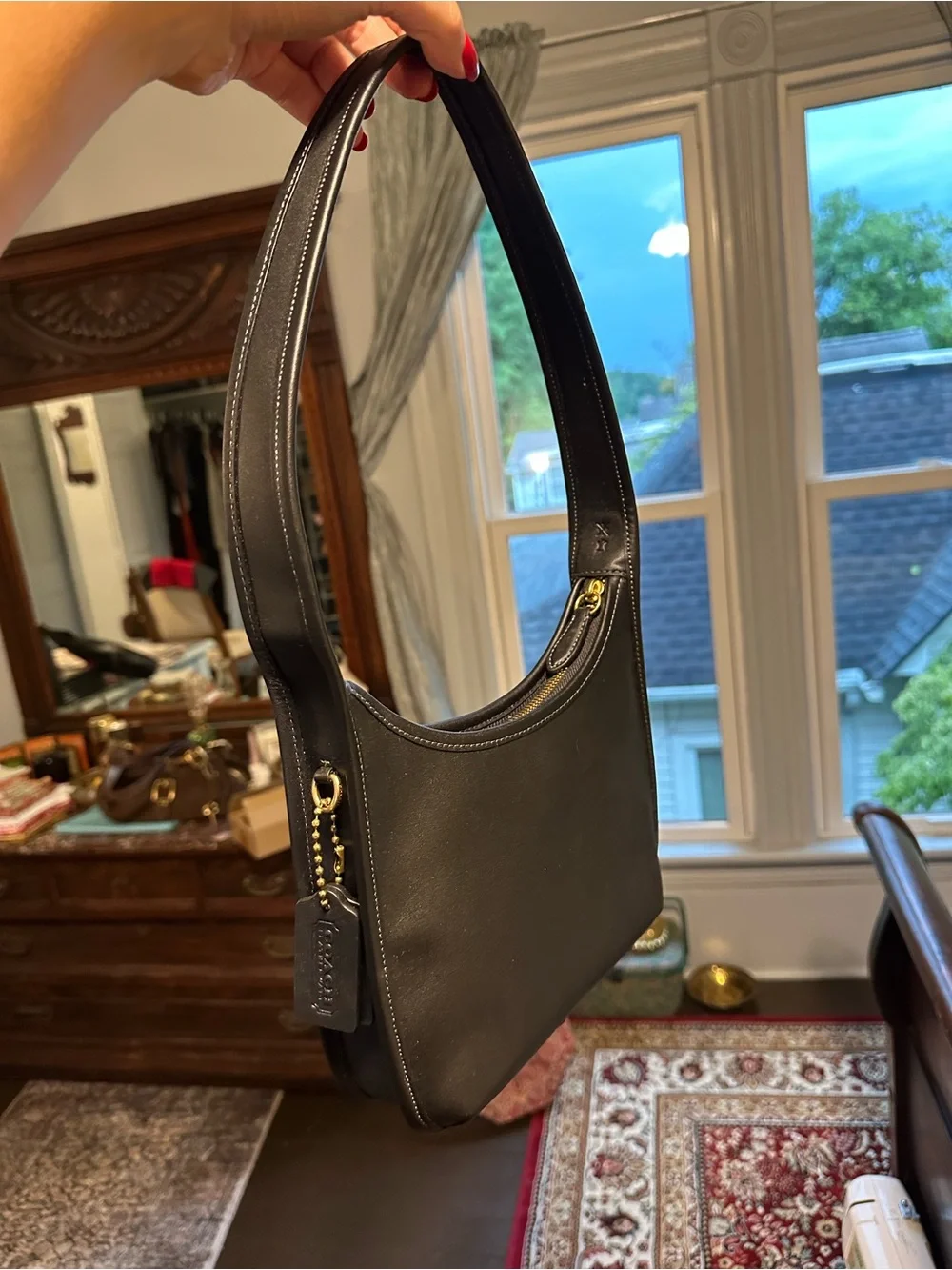 Coach Black curve zip bag with Smooth Leather Finish